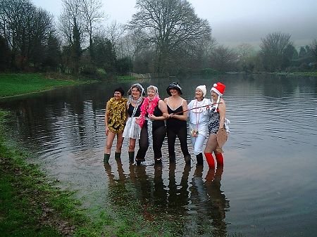 Alkham WI having a paddle